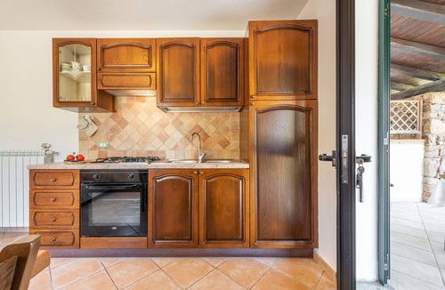 Cala Liberotto Apartment | Bilo Rio: Delightful villa surrounded by greenery and tranquility