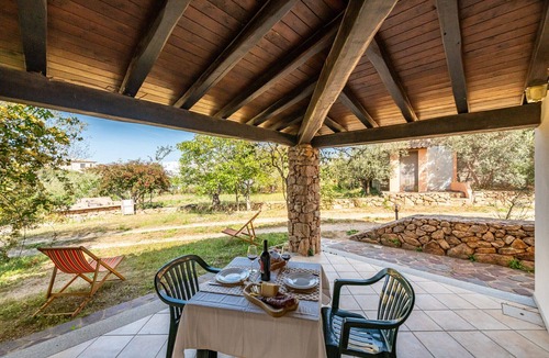 Cala Liberotto Apartment | Bilo Rio: Delightful villa surrounded by greenery and tranquility