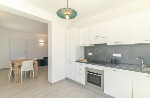 Budoni Apartment | 'Blu con Patio' Apartment with Private Terrace, 3 Minutes from Budoni Beach