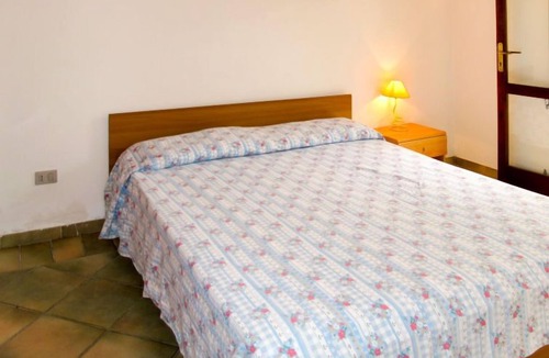 Tanaunella Apartment | Borgo Le Logge (BUD113) by Interhome