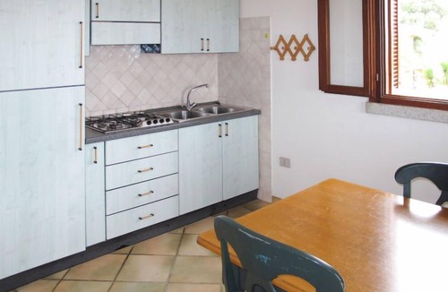 Tanaunella Apartment | Borgo Le Logge (BUD113) by Interhome