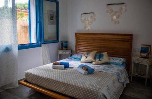 Porto Pino House | Casa Cristina a step from Porto Pino beach