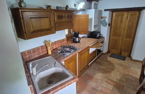Castel Focognano Apartment | Charming Tuscan apartment with a pool, views, and a private terrace