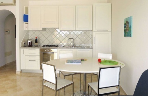 Porto Pozzo Apartment | Cosy apartment for 4 guests with A/C, WIFI, pool, TV, terrace and pets allowed