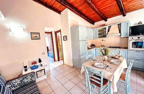 Viddalba Apartment | Cosy apartment for 4 people with pool, A/C, TV and patio