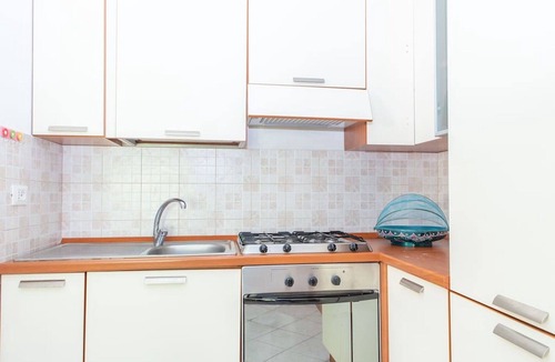 Telti Apartment | Cosy apartment for 6 people with A/C, WIFI, pool, TV, patio and pets allowed