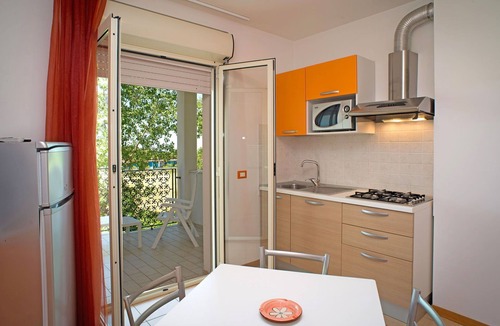 Tortoreto Lido Apartment | Cosy apartment for 4 guests with A/C, WIFI, pool, TV, terrace and pets allowed