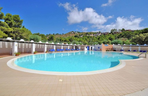 Eden Rock House | Cottage in holiday resort with a pool, detached annex, and large outdoor spaces.
