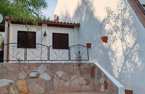 Eden Rock House | Cottage in holiday resort with a pool, detached annex, and large outdoor spaces.