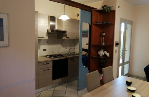 Cala Gonone Apartment | Cozy apartment with veranda CIN IT091017C2000P7610
