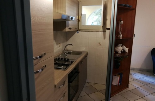 Cala Gonone Apartment | Cozy apartment with veranda CIN IT091017C2000P7610