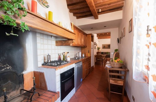 Sant' Ambrogio Apartment | Delightful apartment for 5 people with terrace and exposed beams