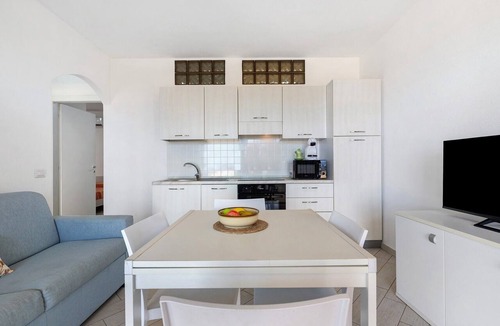 Paduledda Apartment | Deluxe Apartment with Pool, Sea View, Shared Pool, and Air Conditioning