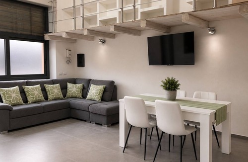 Dorgali Apartment | Elegant and modern loft with loft bedroom a few miles from the sea.