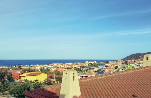 Lu Bagnu Apartment | First floor apartment in a residential complex with communal pool 500 m from the sea in Lu Bagno.