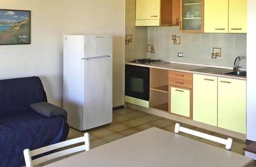 Sant'Elmo Apartment | Flat in Castiadas Costa Rei with balcony, terrace or garden