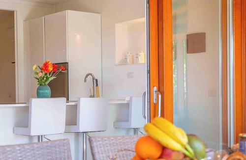 Portisco Apartment | Flat with garden - Just steps from the beach