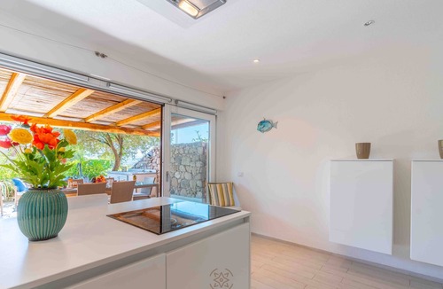 Portisco Apartment | Flat with garden - Just steps from the beach