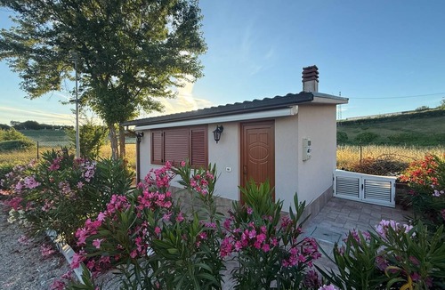 Roseto degli Abruzzi Cottage | Garden Cottage with a fireplace in the garden of a villa with a pool, 5 minutes from the beach