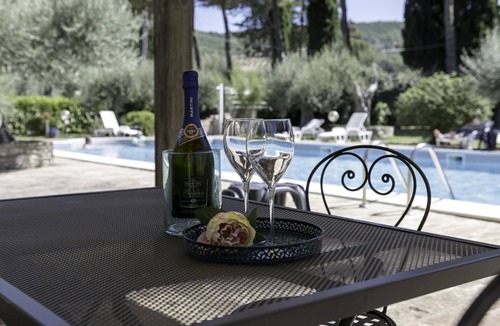 Passignano sul Trasimeno Apartment | GuestHost - Cozy apartment equipped with all comforts to accommodate up to 3 people. The flat is located in a renovated former period oil mill, which offers to its guests many shared services: access to the seasonal pool, small area used as a gym, playgr