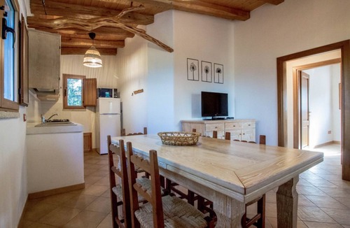 Arzachena Villa | GuestHost - A welcoming and charming 71 square meters villa, perfect for four people, with a private entrance (two steps to access).The property is located in an extremely quiet location and is surrounded by the lush Sardinian nature: from the veranda yo