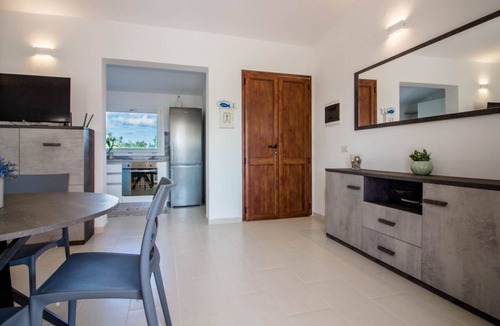 Porto Istana Apartment | GuestHost - Charming 60 sqm apartment located *1.2 km from Porto Istana Beach*. The accommodation is on the *first floor* (stairs required for access) and can accommodate up to *5 adults*.The property consists of *two bedrooms, a bathroom, a livin