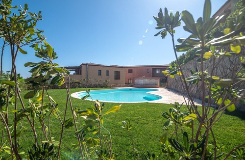 Santa Teresa di Gallura Apartment | Holiday Apartment "La Rosa dei Venti" with Sea View, Shared Pool & Private Terrace