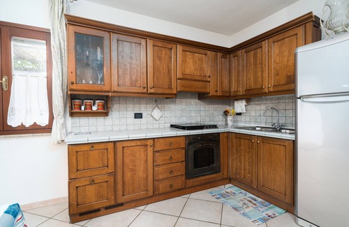 Siniscola Apartment | Holiday Apartment "Comfortable and Cool Basement" with Private Terrace, Garden and Wi-Fi