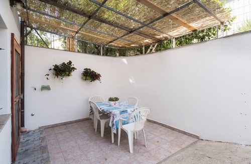 Siniscola Apartment | Holiday Apartment "Comfortable and Cool Basement" with Private Terrace, Garden and Wi-Fi