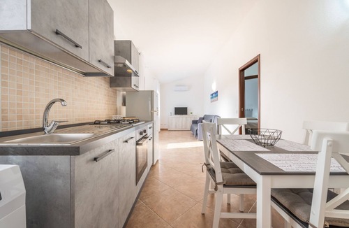 Masainas Apartment | Holiday Apartment "Is Lais 2" with Sea View, Shared Garden & Wi-Fi