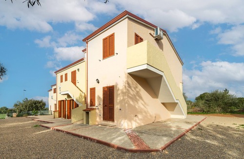 Masainas Apartment | Holiday Apartment "Is Lais 2" with Sea View, Shared Garden & Wi-Fi