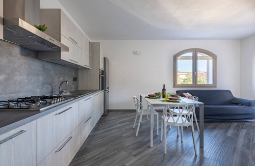 Bari Sardo House | Holiday Apartment LaTorre with Balcony, Terrace and Shared Garden