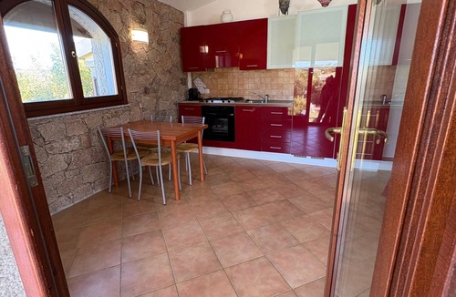 Aglientu House | Holiday Home 'Appartamento Baia 12' with Private Garden, Wi-Fi and Air Conditioning