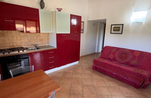 Aglientu House | Holiday Home 'Appartamento Baia 12' with Private Garden, Wi-Fi and Air Conditioning