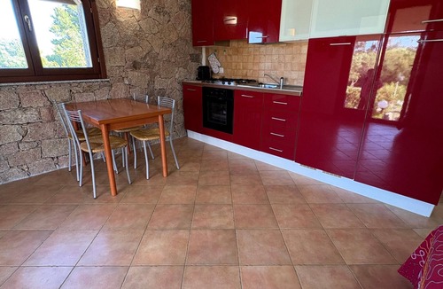 Aglientu House | Holiday Home 'Appartamento Baia 12' with Private Garden, Wi-Fi and Air Conditioning
