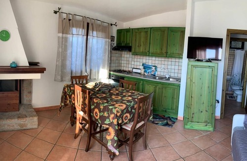 Paduledda House | Holiday Home "Breathtaking View in Isola Rossa" with Sea View, Private Terrace & AC