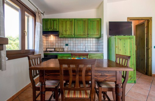 Paduledda House | Holiday Home "Breathtaking View in Isola Rossa" with Sea View, Private Terrace & AC