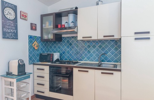 San Teodoro House | Holiday Home “Home Residence Barbara” with Garden & Balcony