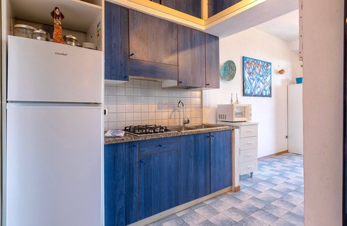 Stintino House | Holiday Home 'I Lentischi C13' with Sea View, Private Terrace and Air Conditioning