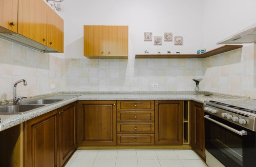 Palmas Arborea House | Holiday Home 'Il Corbezzolo Apartment' with Shared Terrace, Wi-Fi and Air Conditioning