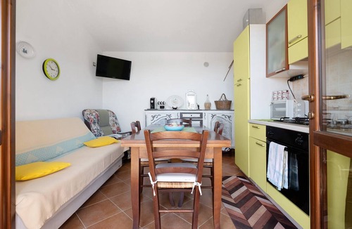 Masainas House | Holiday Home 'La Pavoncella' with Sea View, Wi-Fi and Air Conditioning