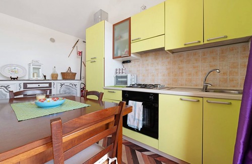 Masainas House | Holiday Home 'La Pavoncella' with Sea View, Wi-Fi and Air Conditioning
