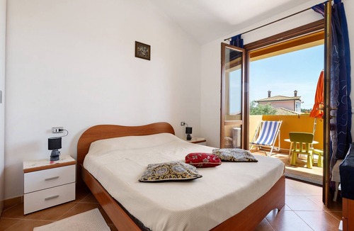 Masainas House | Holiday Home 'La Pavoncella' with Sea View, Wi-Fi and Air Conditioning