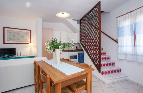Luddui House | Holiday Home "Mirtagru Casa Della Sughereta" with Sea View, Terrace and Wi-Fi