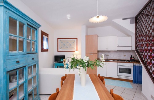 Luddui House | Holiday Home "Mirtagru Casa Della Sughereta" with Sea View, Terrace and Wi-Fi