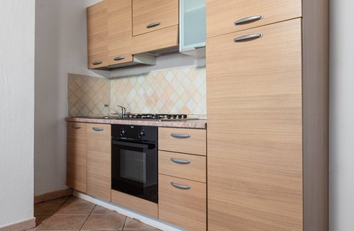 Baia Caddinas House | Holiday Home 'Orizzonti 33' with Sea View, Private Terrace and Air Conditioning