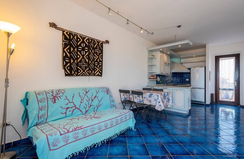 La Pelosa House | Holiday Home "Pergola 714" Steps from the Beach with Sea View and Balcony