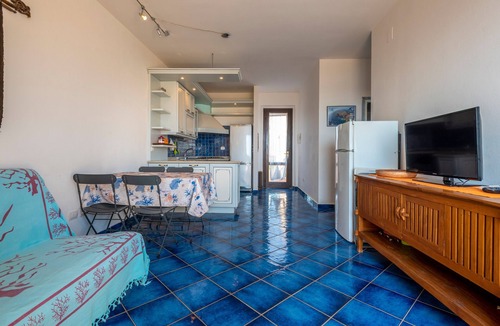 La Pelosa House | Holiday Home "Pergola 714" Steps from the Beach with Sea View and Balcony