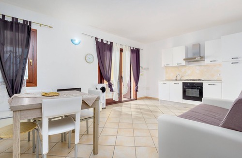 Baia Caddinas House | Holiday Home 'Residence Orizzonti App N 23' with Sea View, Private Terrace and Air Conditioning