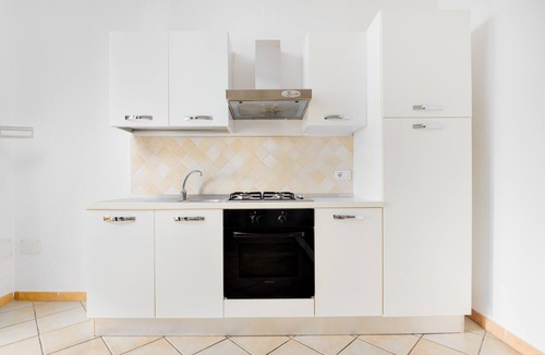 Baia Caddinas House | Holiday Home 'Residence Orizzonti App N 23' with Sea View, Private Terrace and Air Conditioning